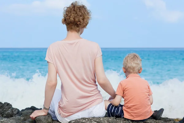 Mother and her son at the beach — Stock Photo, Image