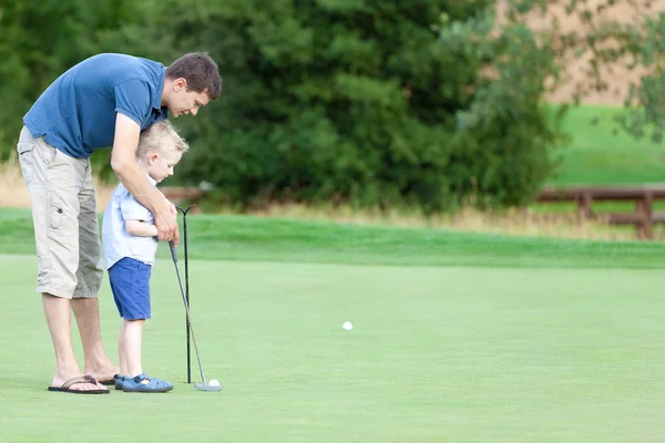Family golfing — Stock Photo, Image