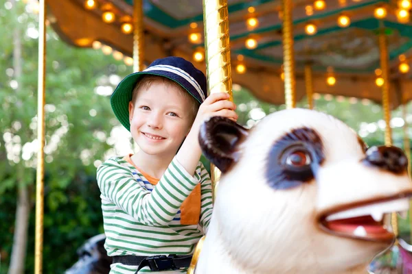 Kid at the merry-go-round — Stock Photo, Image