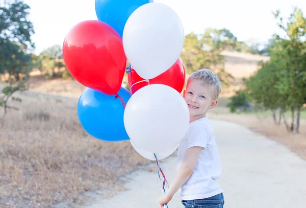 Boy celebrating 4th of July — Stock Photo, Image