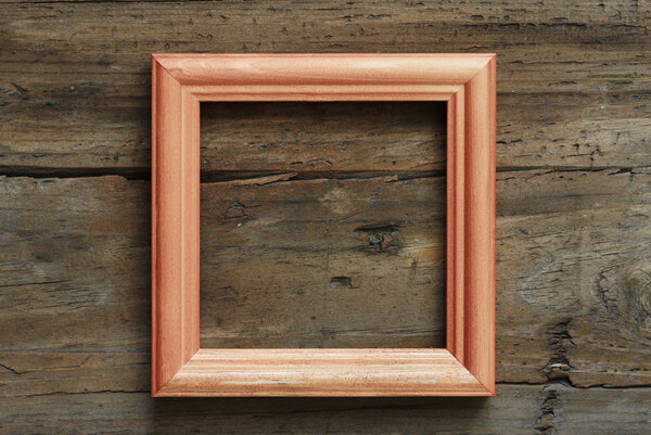 photo frame on wooden wall