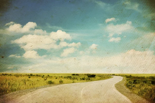 Road in a field — Stock Photo, Image