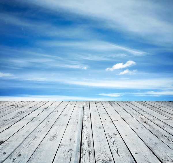 Sunset sky and wood floor — Stock Photo, Image