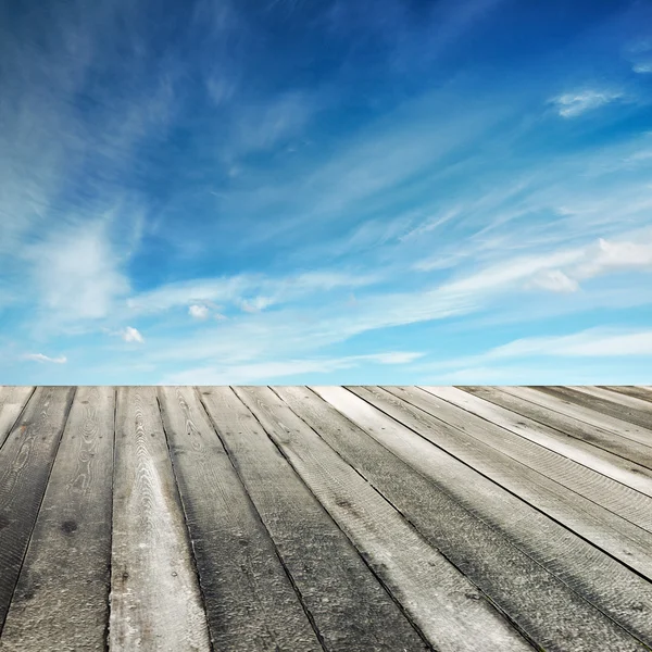 Sunset sky and wood floor — Stock Photo, Image