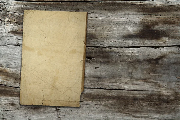 Papel vintage sobre textura de madera —  Fotos de Stock