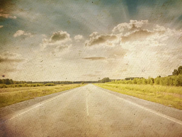 Road in a fields — Stock Photo, Image