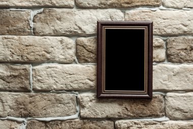 tuğla duvar fotoğraf çerçevesi