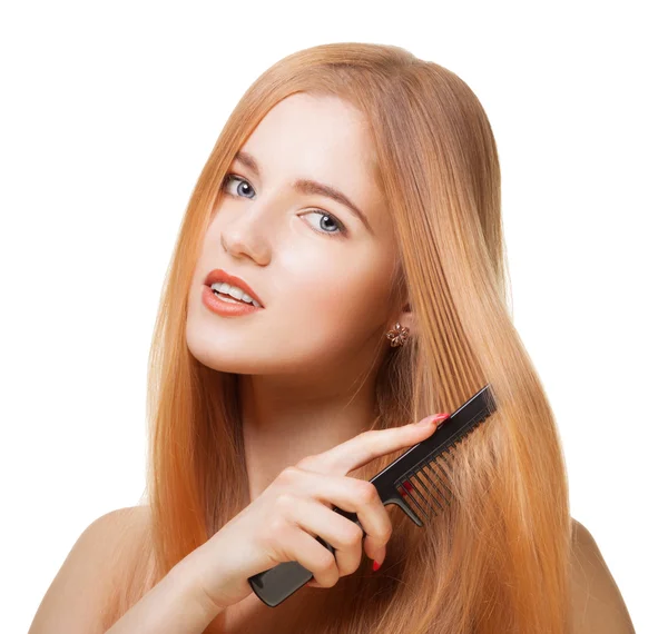 Girl with comb — Stock Photo, Image