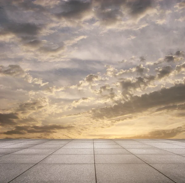 Sunset sky and grey floor — Stock Photo, Image