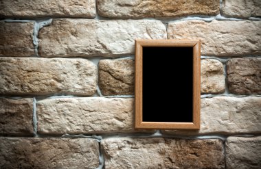 tuğla duvar fotoğraf çerçevesi