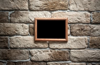 tuğla duvar fotoğraf çerçevesi