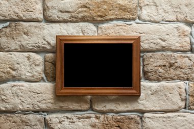 tuğla duvar fotoğraf çerçevesi