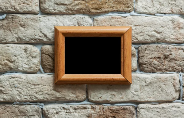 Moldura de foto na parede de tijolo — Fotografia de Stock