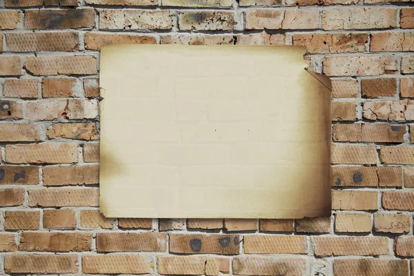 Paper on brickwall — Stock Photo, Image