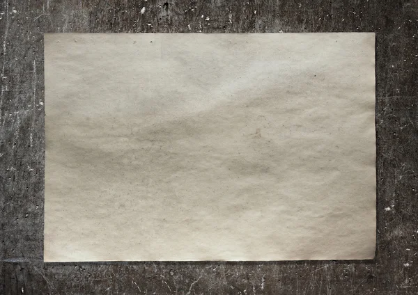 Vieux papier sur le mur — Photo