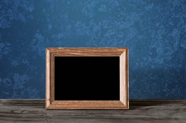 Wooden Photo Frame Table Blue Wall — Stock Photo, Image