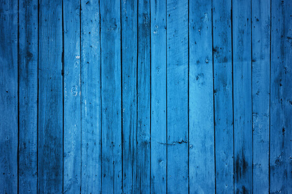 old wooden wall, blue background