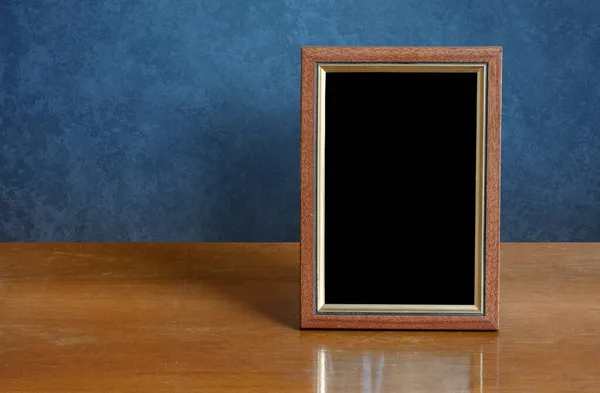 Wooden Photo Frame Table Blue Wall — Stock Photo, Image