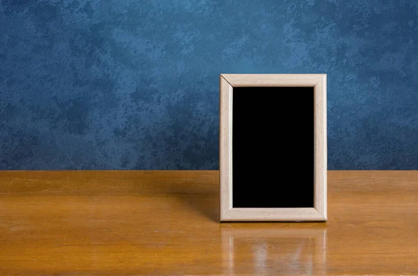 Wooden Photo Frame Table Blue Wall — Stock Photo, Image