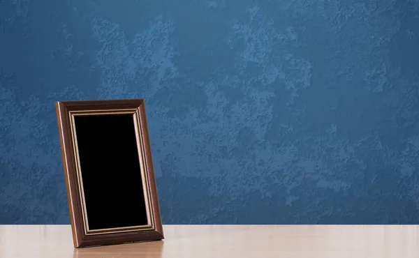 Wooden Photo Frame Table Blue Wall — Stock Photo, Image