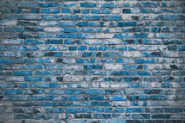 Eski tuğla duvar. mavi arkaplan.