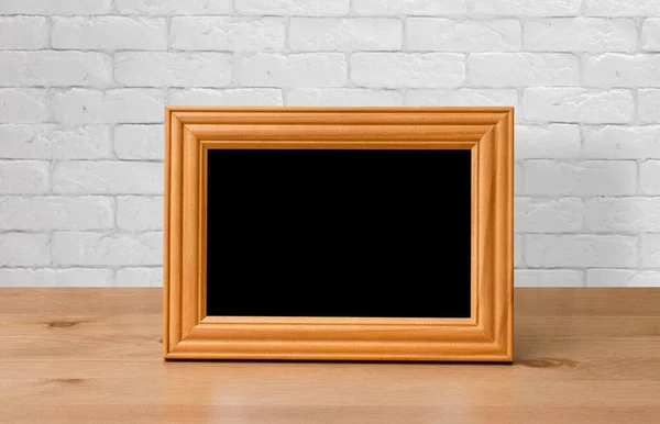 Old Photo Frame Wooden Table White Brick Wall — Stock Photo, Image