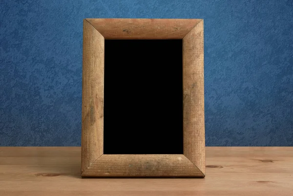 Wooden Photo Frame Table Blue Wall — Stock Photo, Image
