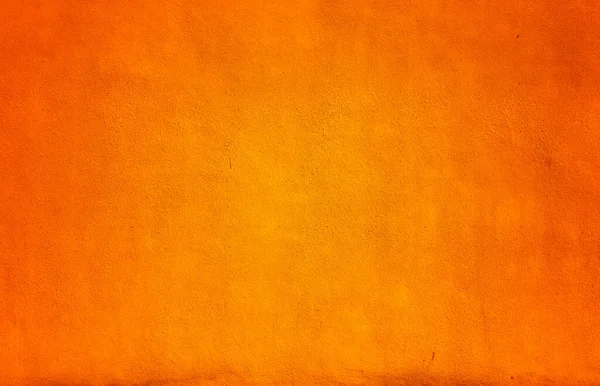 オレンジコンクリートの背景古いグランジ石膏壁 — ストック写真
