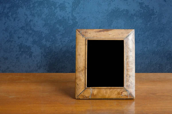 Wooden Photo Frame Table Blue Wall — Stock Photo, Image