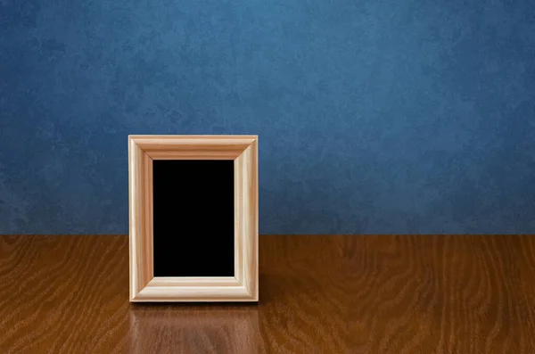 Wooden Photo Frame Table Blue Wall — Stock Photo, Image