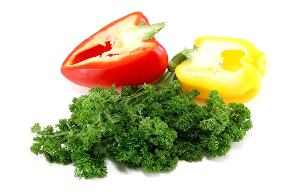 Cut peppers with curly parsley — Stock Photo, Image