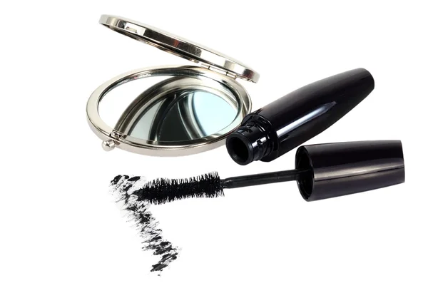 Small mirror and ink for eyelashes — Stock Photo, Image