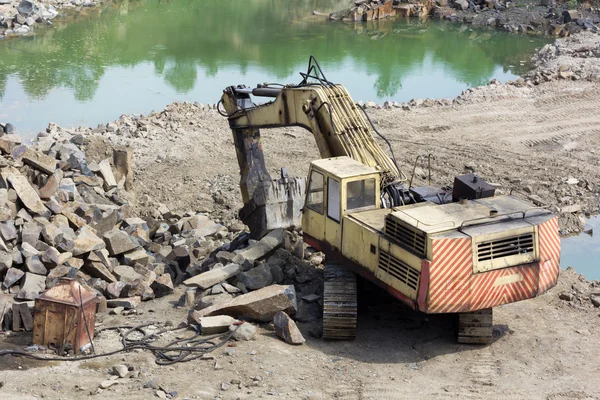 Excavator machine doing earthmoving work Stock Photo