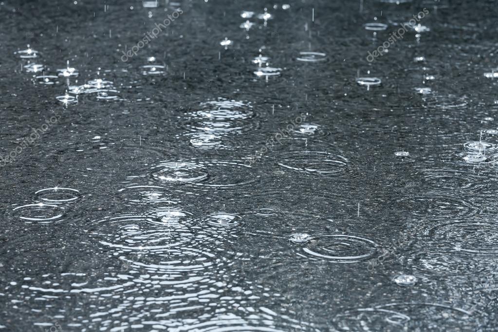 Rain drops in puddles ??? Stock Photo ?? MrTwister 28491977
