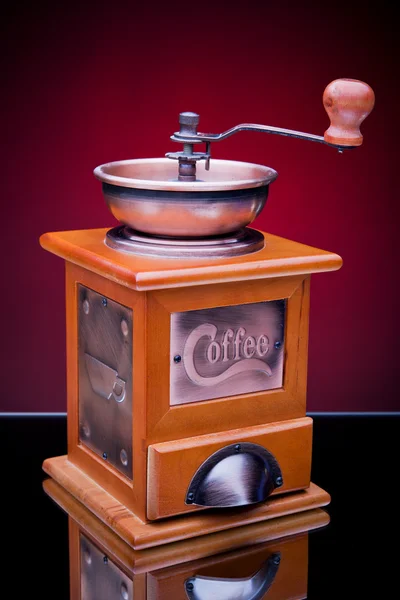 Närbild av en gammaldags kaffekvarn Stockbild