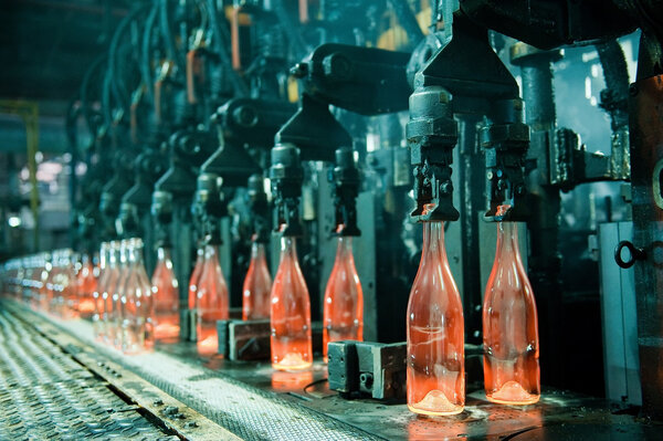 Row of hot orange glass bottles
