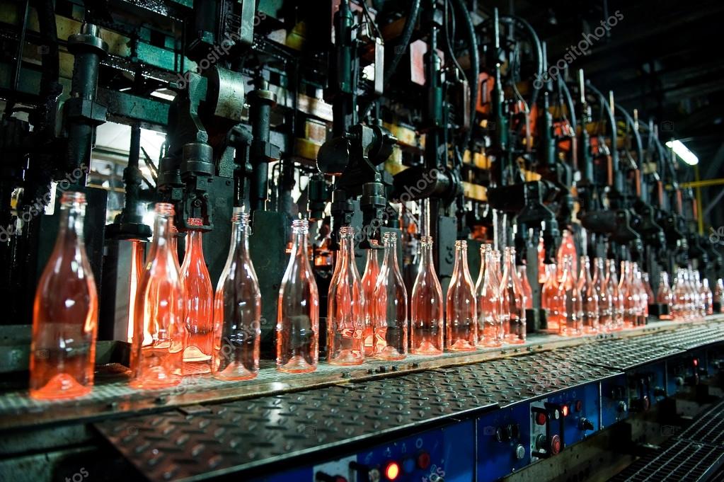 Bottle factory, row of glass bottles — Stock Photo © kiriak09 24936413