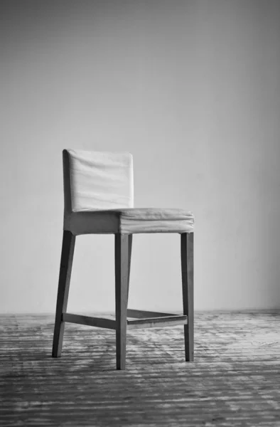 Chair on wall background — Stock Photo, Image