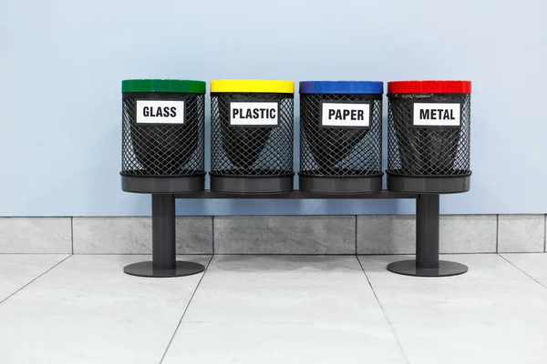 Four garbage bins — Stock Photo, Image