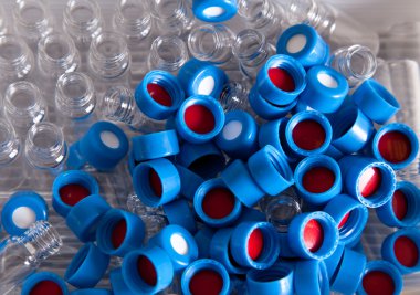 Disposable caps and bottles for chromatography and chemistry exp clipart
