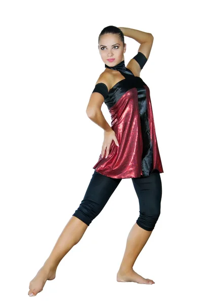 Young dancer dances in a red dress — Stock Photo, Image