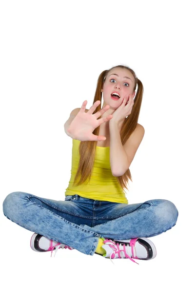 Chica en una camiseta amarilla y vaqueros azules — Foto de Stock