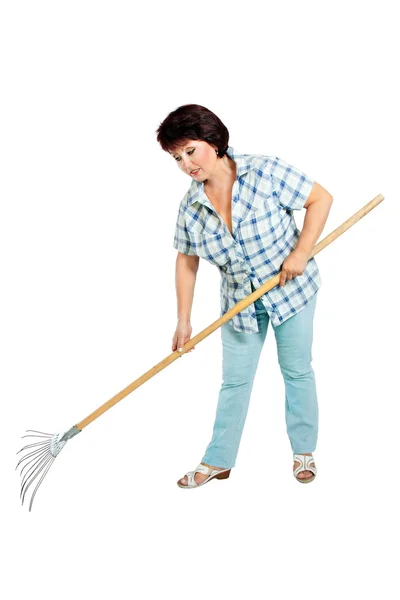 Image of woman farmer with rakes in hands — Stock Photo, Image