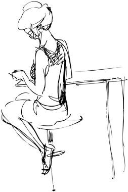 Girl sits on a high chair in a cafe