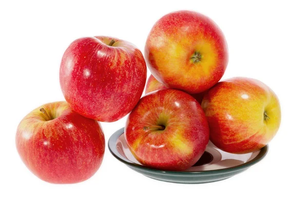 Ripe red apples on a plate — Stock Photo, Image