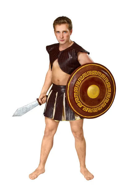 Joven guerrero masculino con un escudo — Foto de Stock