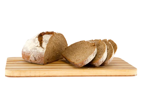 Pagnotta di pane su una tavola di legno — Foto Stock