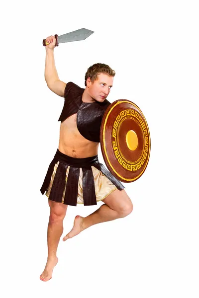 Young male warrior with a shield — Stock Photo, Image