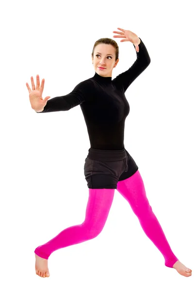 Retrato de una chica sobre un fondo blanco en pose de baile —  Fotos de Stock