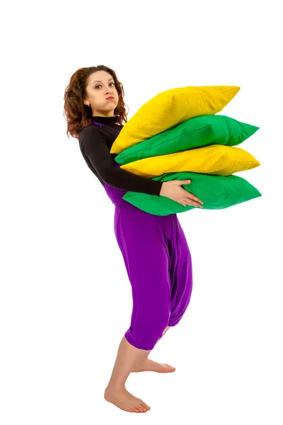 Woman with cushions on a white background — Stock Photo, Image